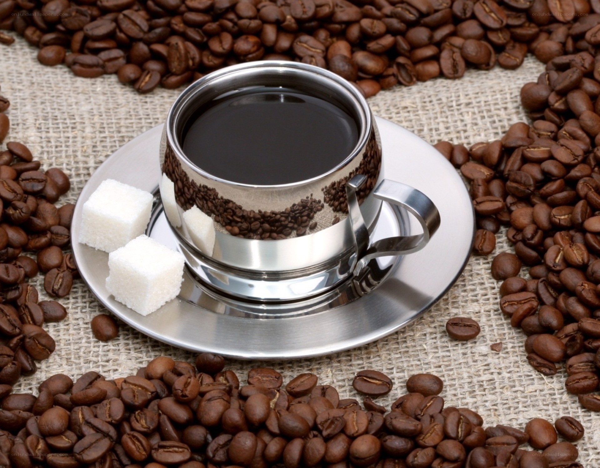coffee cup with beans and sugar
