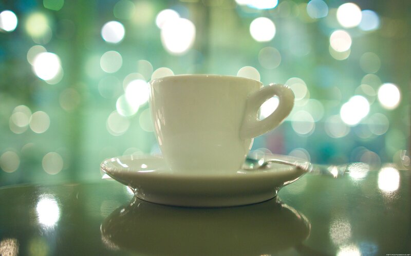 coffee cup with bokeh lights