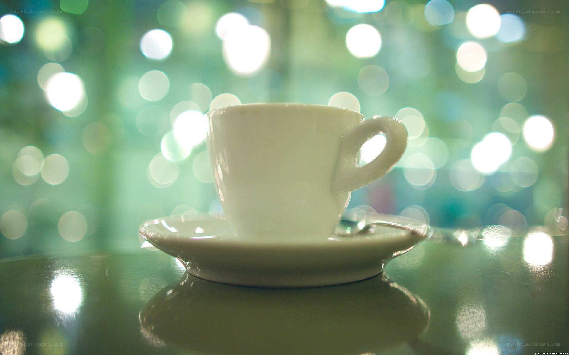 coffee cup with bokeh lights