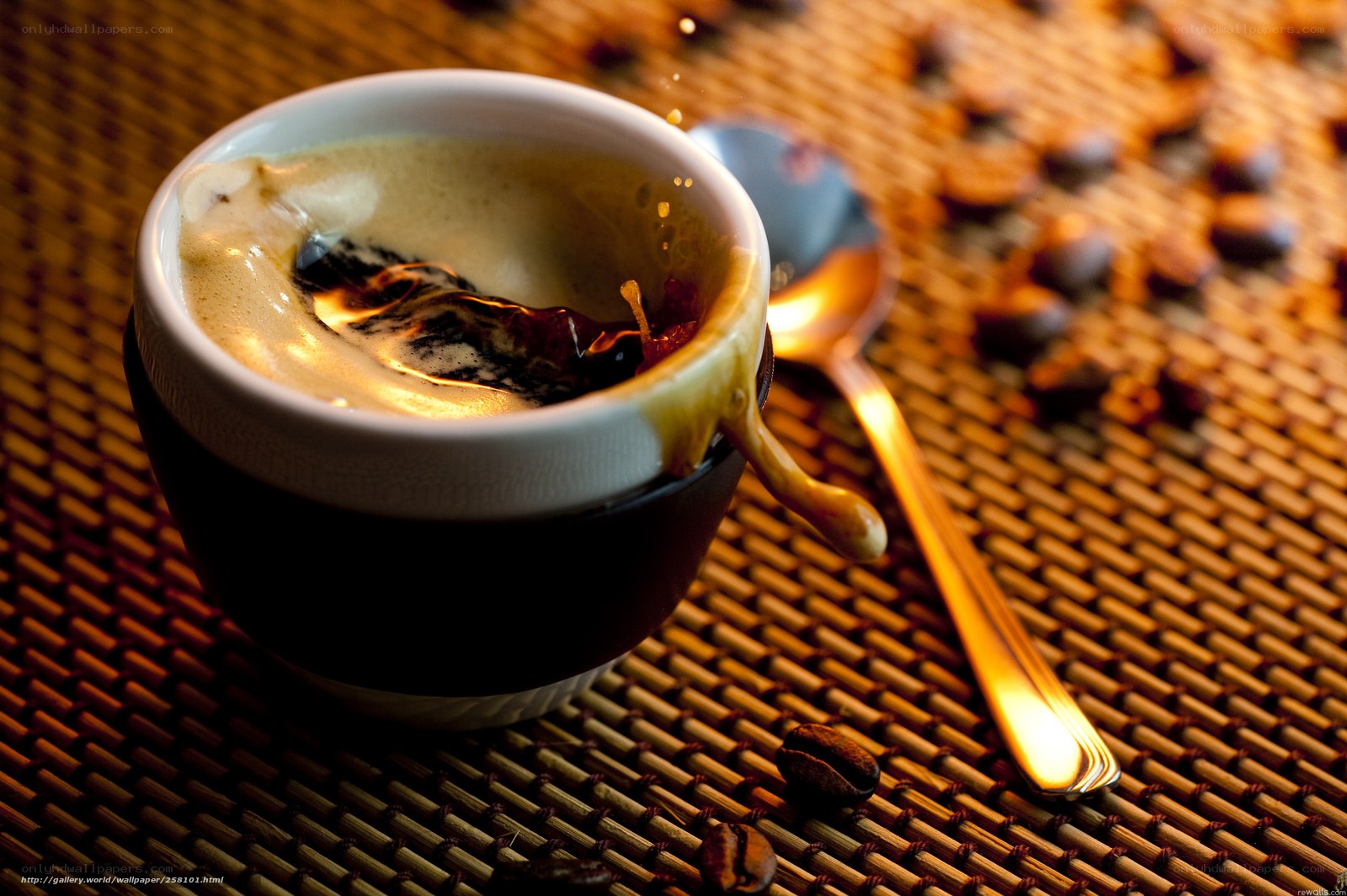 coffee cup with foam and beans