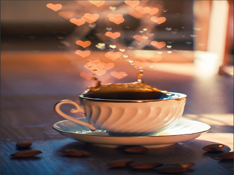 Coffee Cup with Heart Bokeh