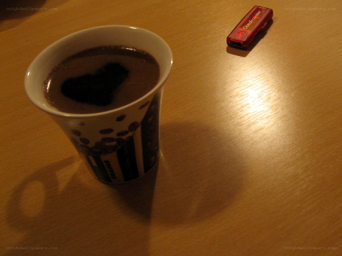 coffee cup with heart-shaped foam