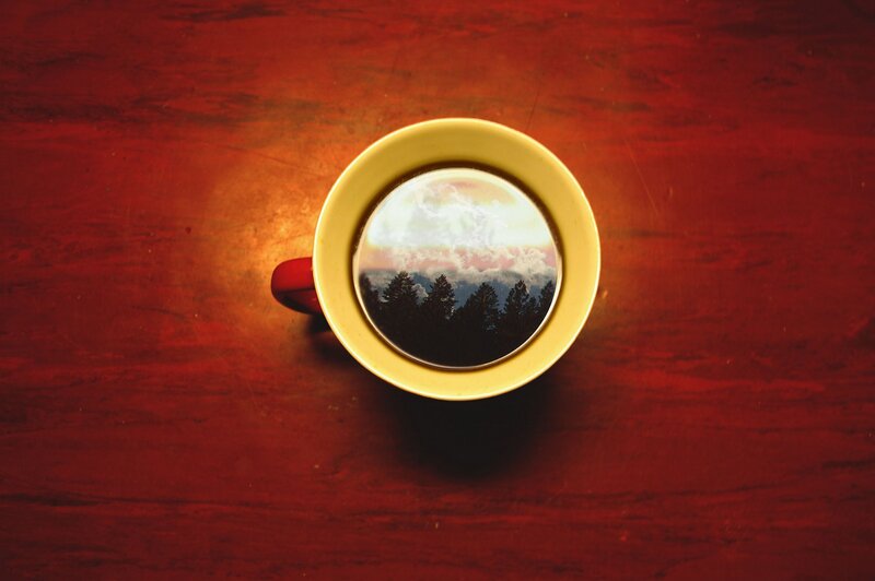 Coffee Cup with Landscape Reflection
