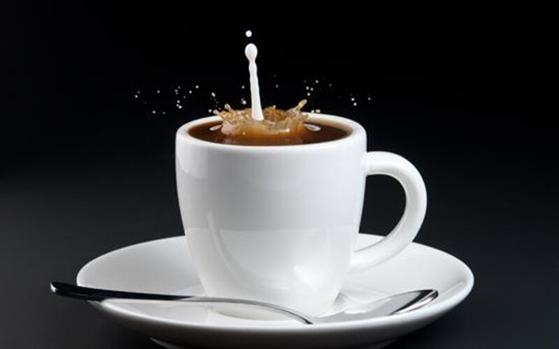 Coffee Cup with Milk Splash