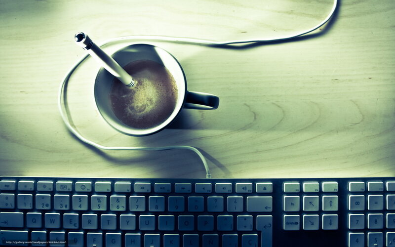 coffee cup with pen on desk
