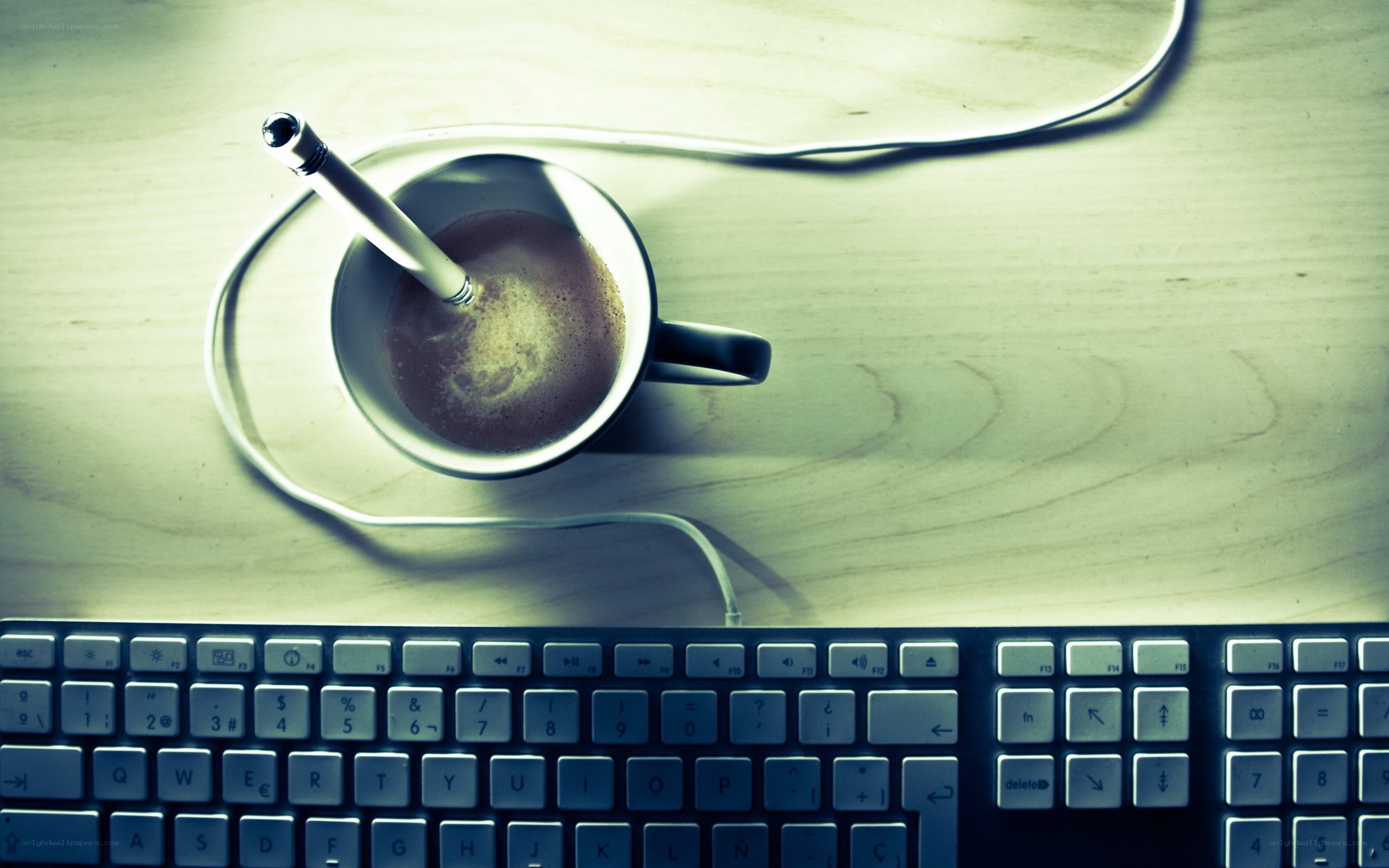 coffee cup with pen on desk