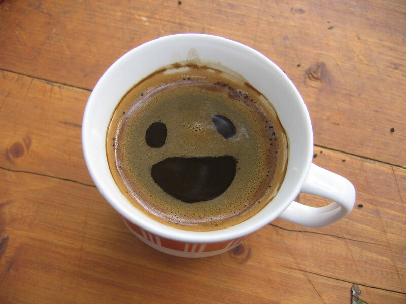 coffee cup with smiley face