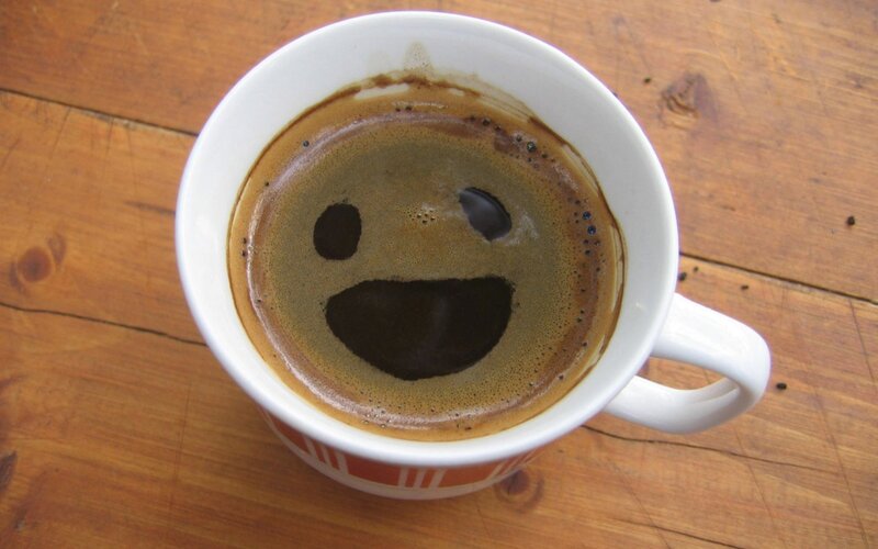 coffee cup with smiley face