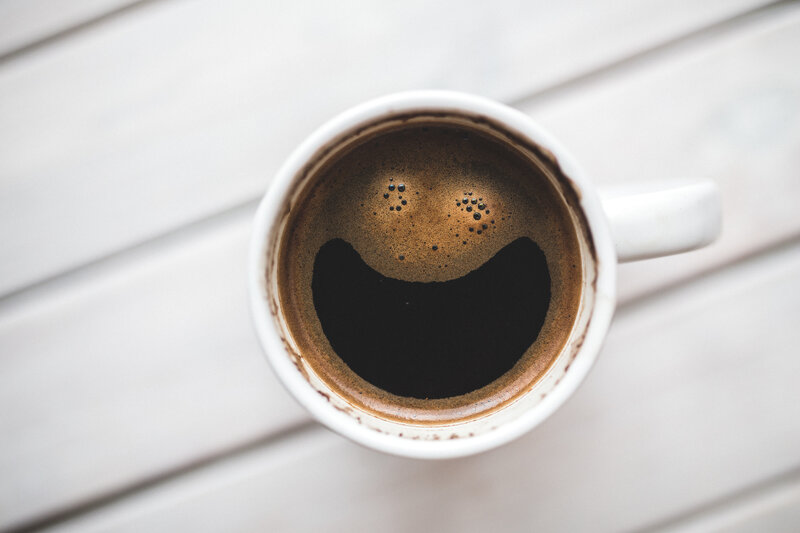 coffee cup with smiley face