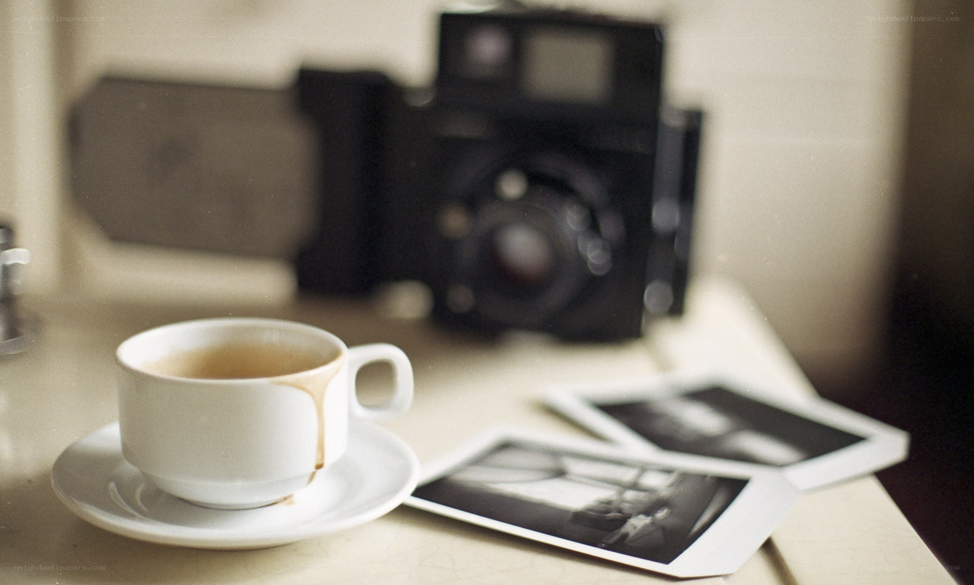 coffee cup with vintage camera