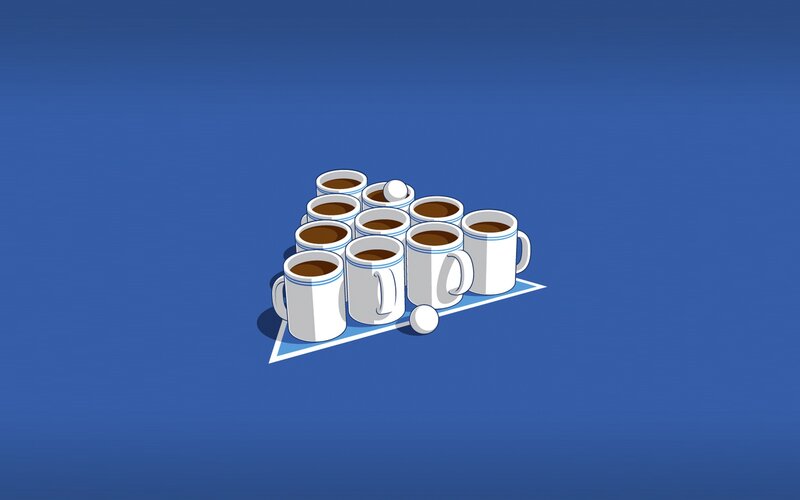 coffee cups arranged in triangle