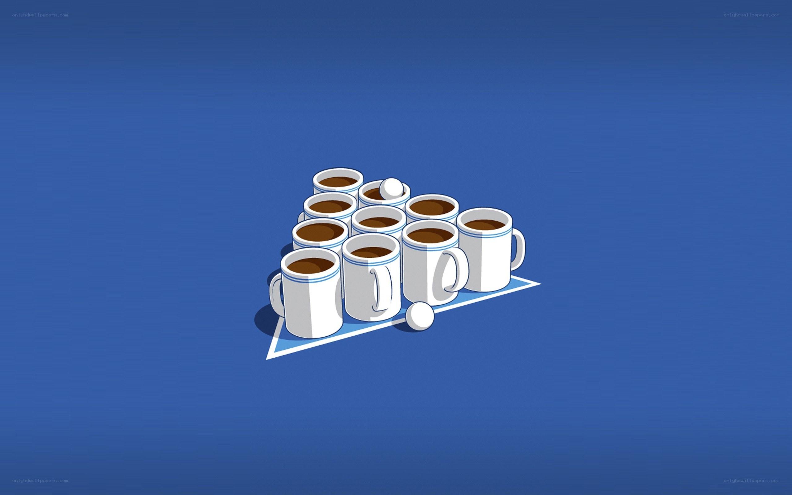 coffee cups arranged in triangle