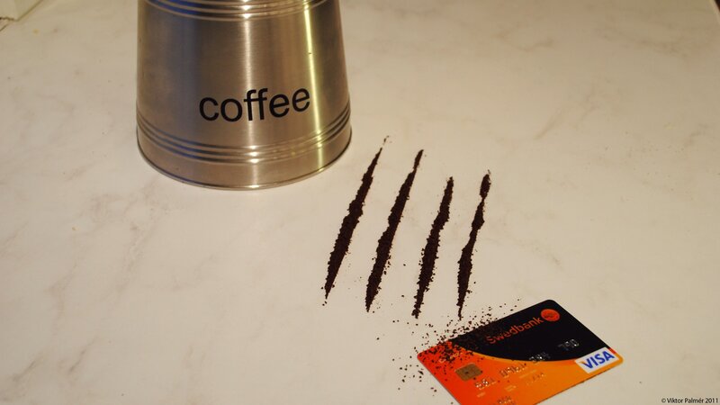 Coffee Grounds and Credit Card