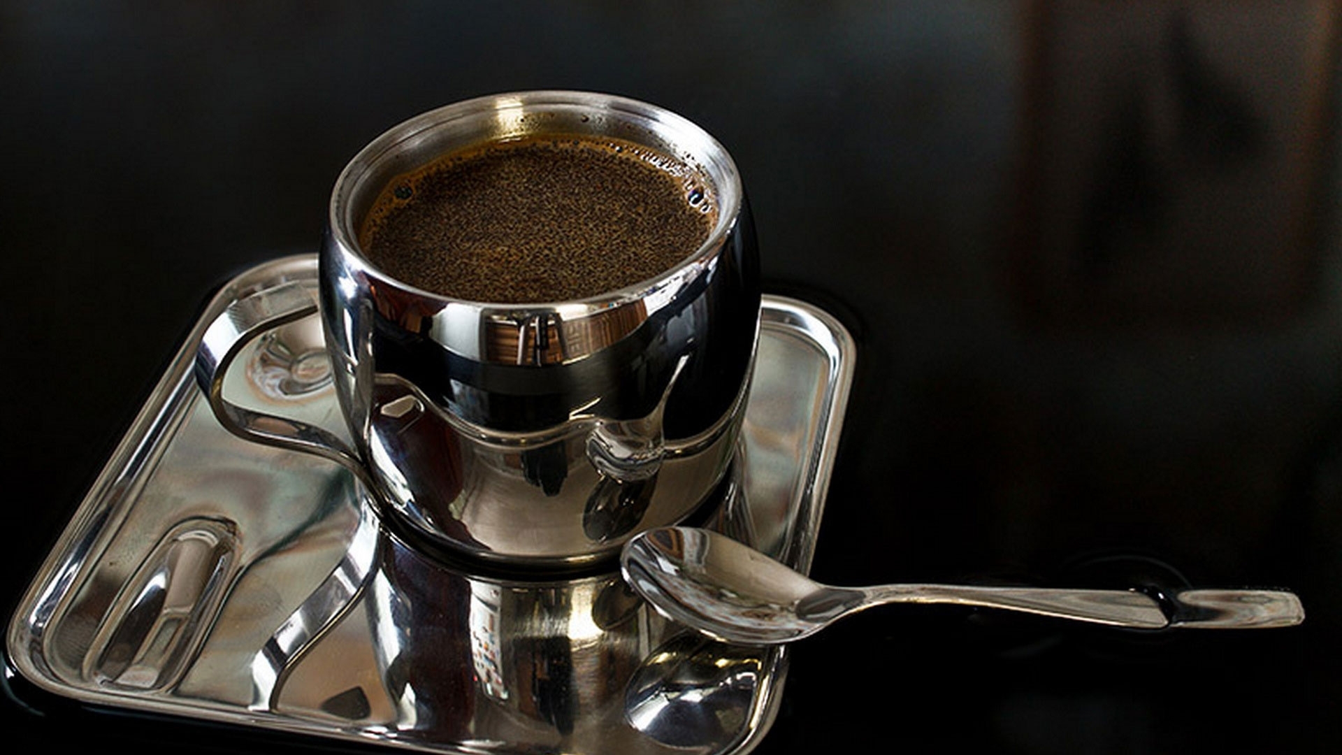 coffee in a silver cup