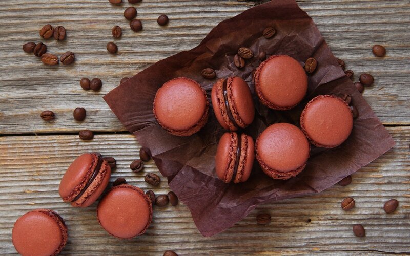Coffee macarons on wood