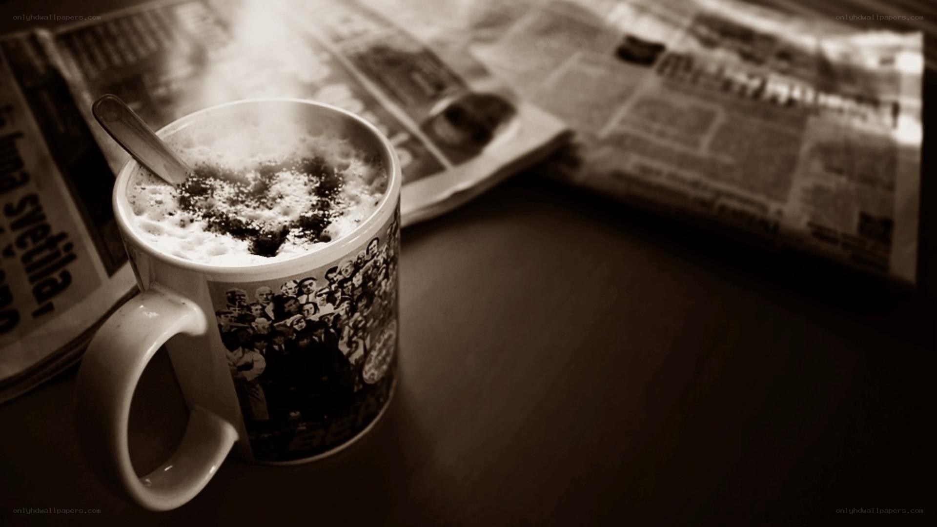 coffee mug on newspaper