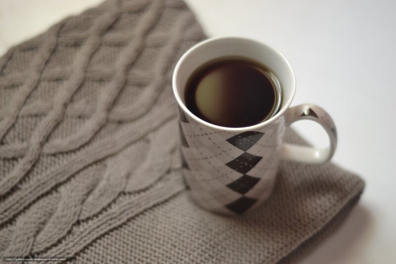 coffee mug on sweater