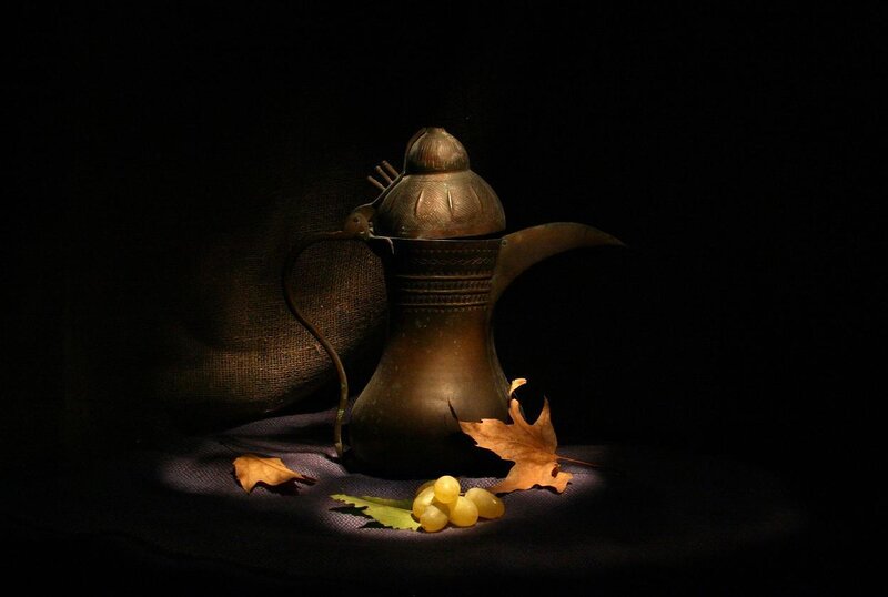 coffee pot with grapes and leaves