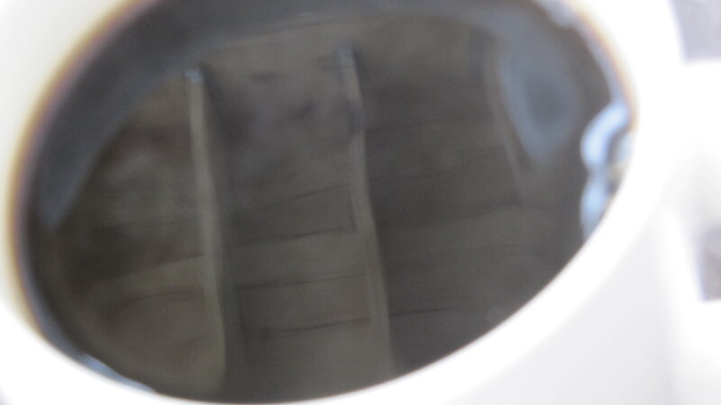 coffee reflection in a cup