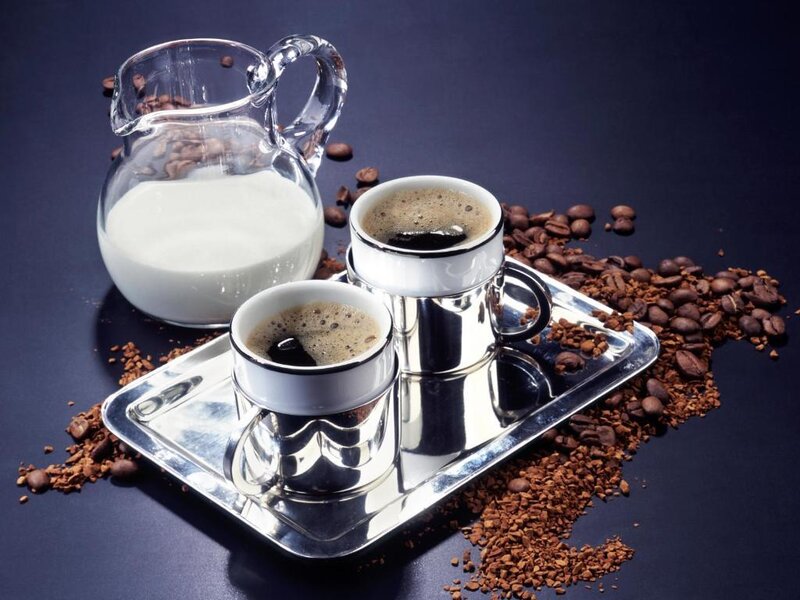 coffee setup with milk and beans