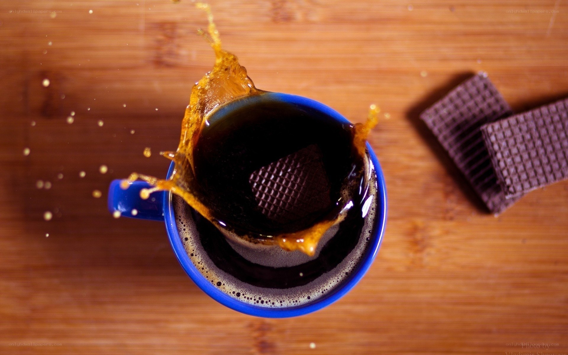 coffee splash in blue mug