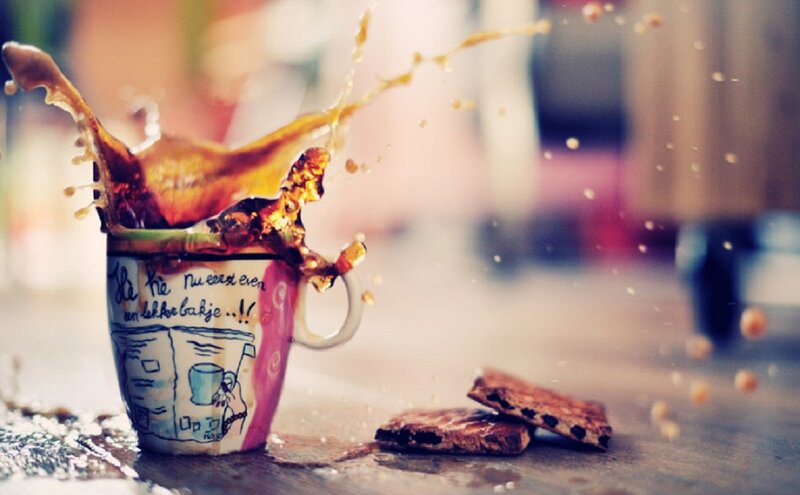 Coffee Splashing from Cup — Brown