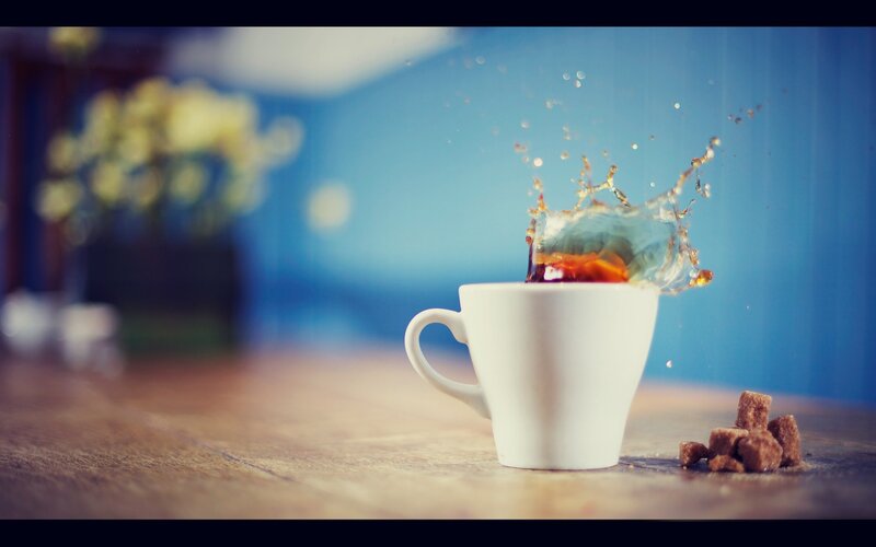 coffee splashing in a cup