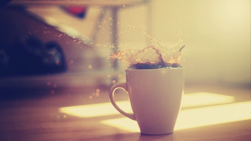 coffee splashing in a mug