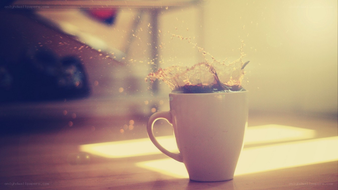 coffee splashing in a mug