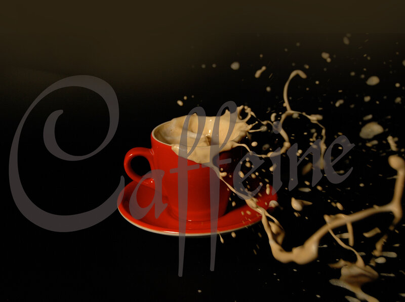 coffee splashing in a red cup