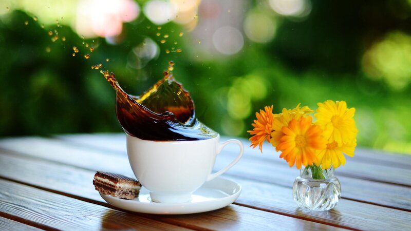 Coffee Splashing in Cup — White