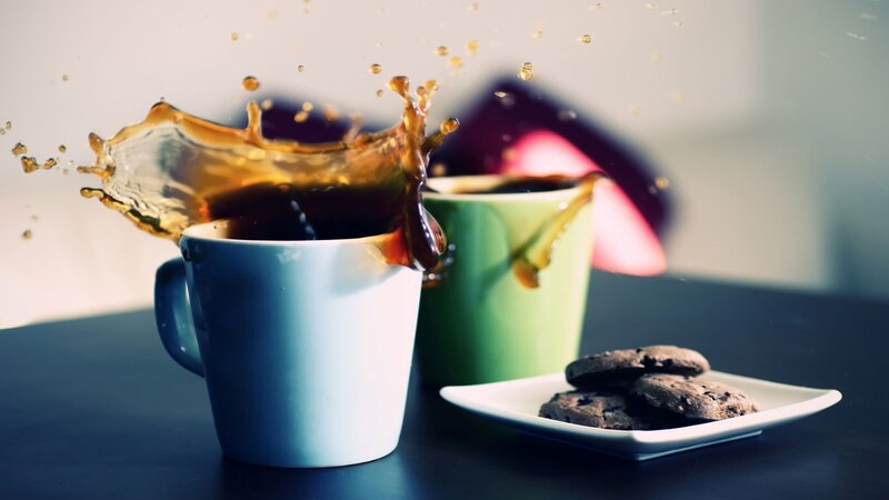 coffee splashing in cups