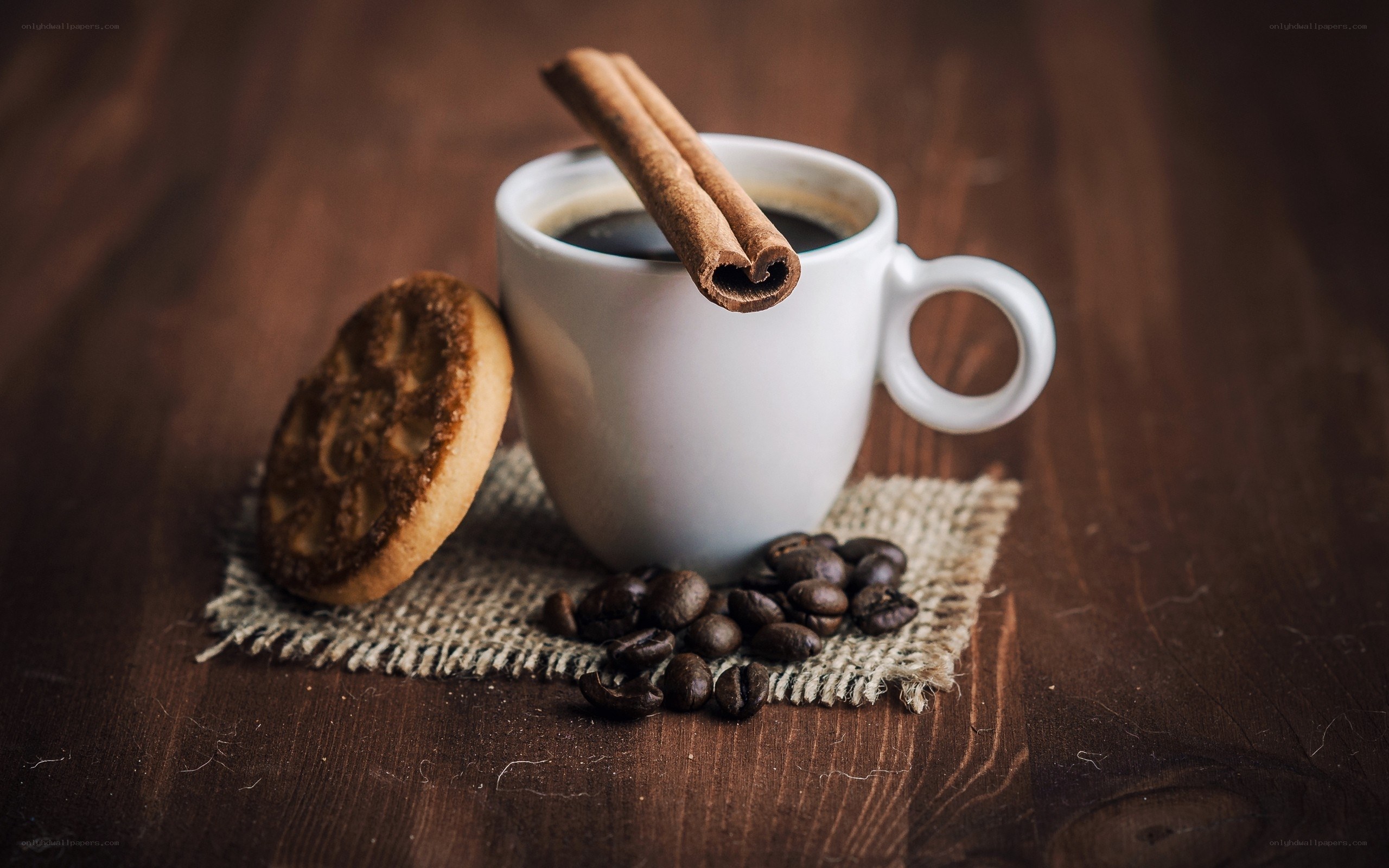coffee with cinnamon and cookie