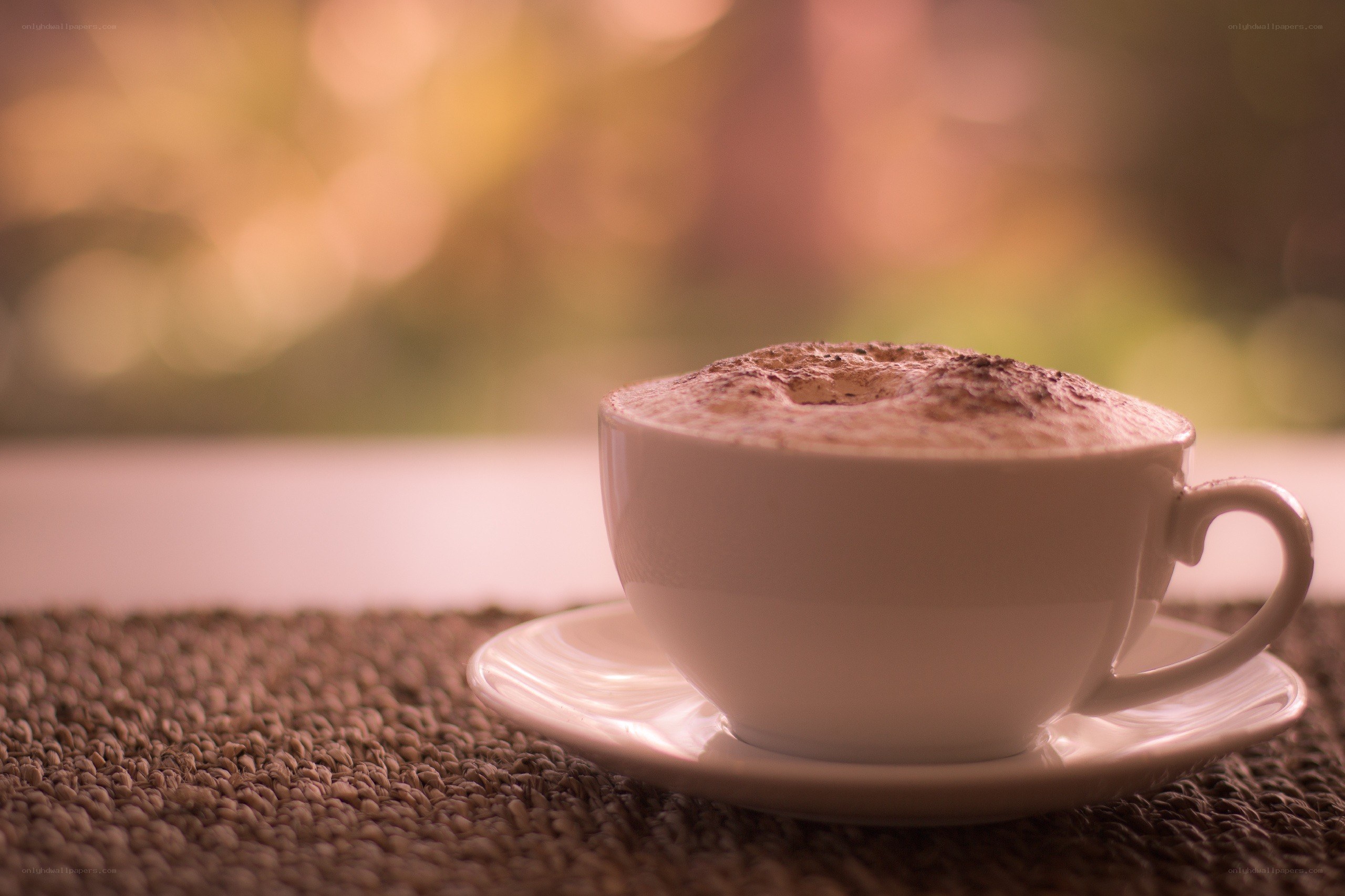 coffee with foam on a mat