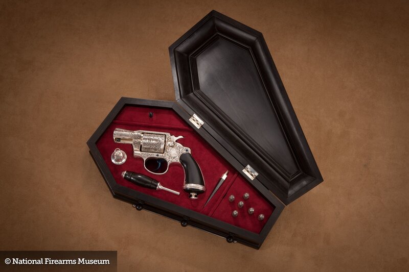 Coffin-shaped gun case