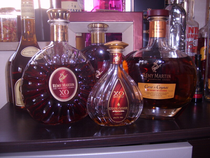 Cognac bottles on a shelf