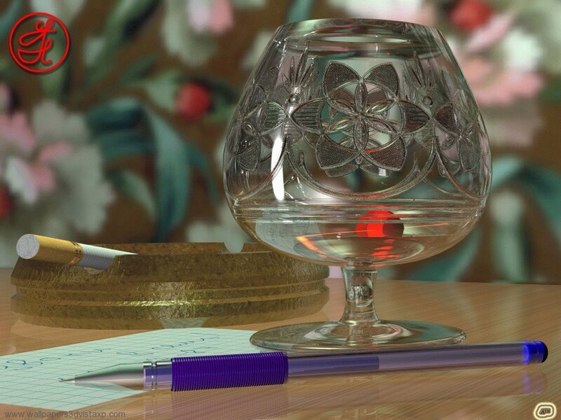 Cognac glass and pen on desk