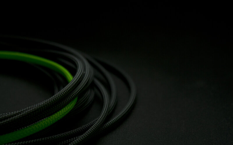 coiled cables on black surface