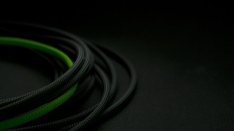 coiled cables on dark surface