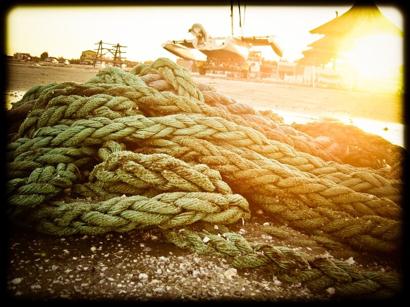 coiled rope on a beach