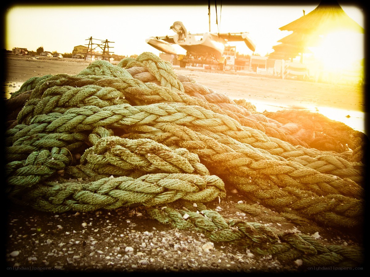 coiled rope on a beach