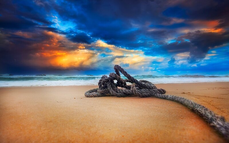 Coiled Rope on Beach — Blue, Dramatic