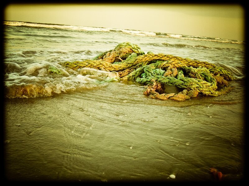 coiled rope on beach
