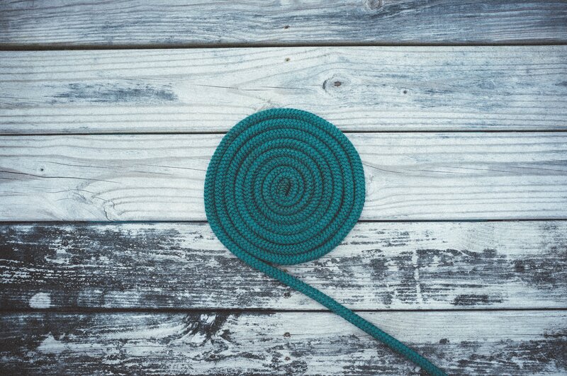coiled rope on wood