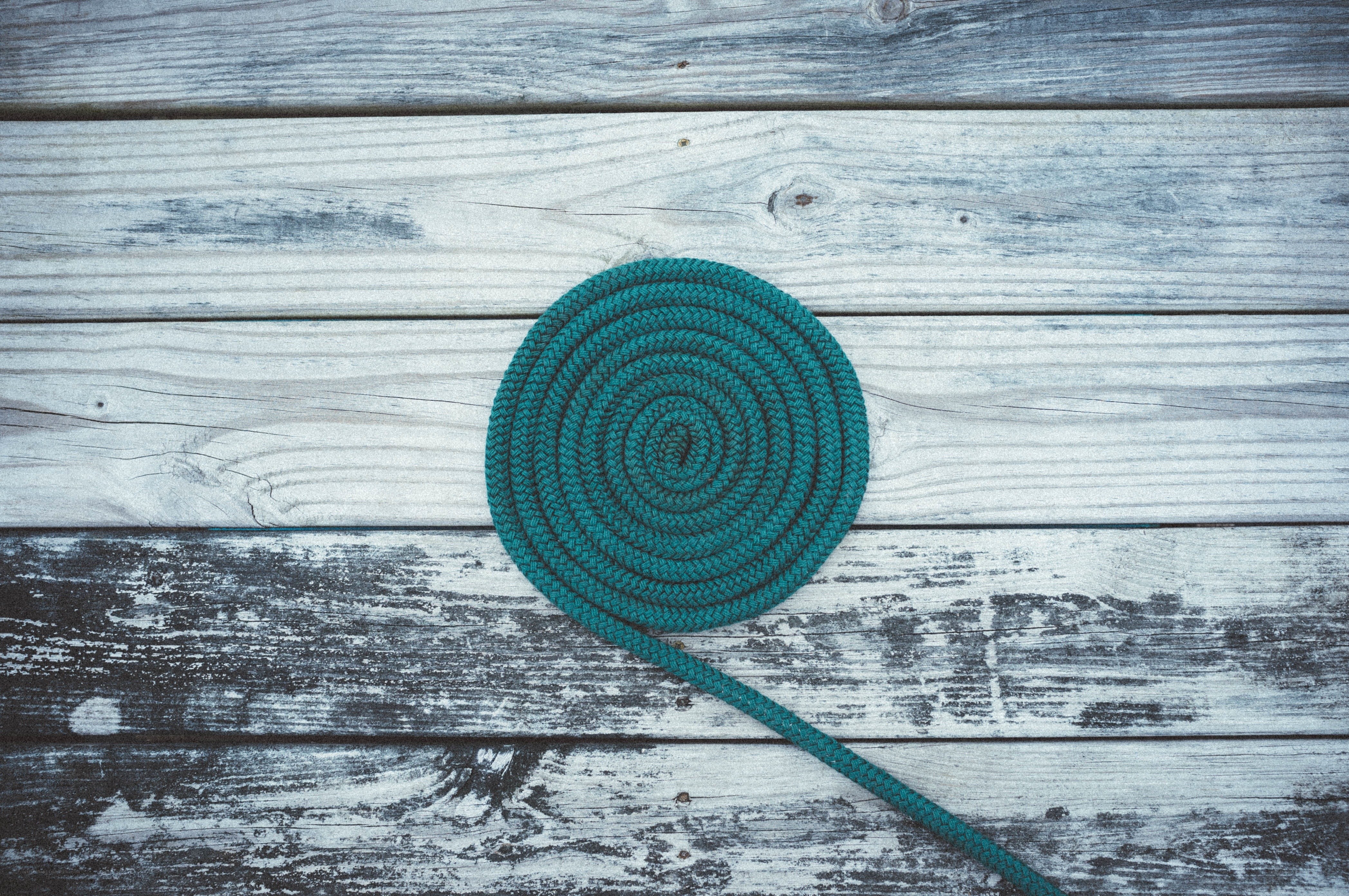 coiled rope on wood