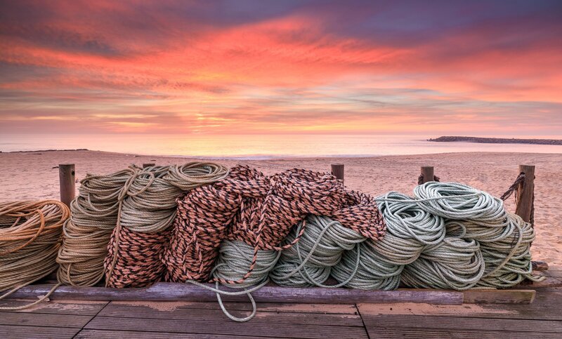 Coiled Ropes on Beach