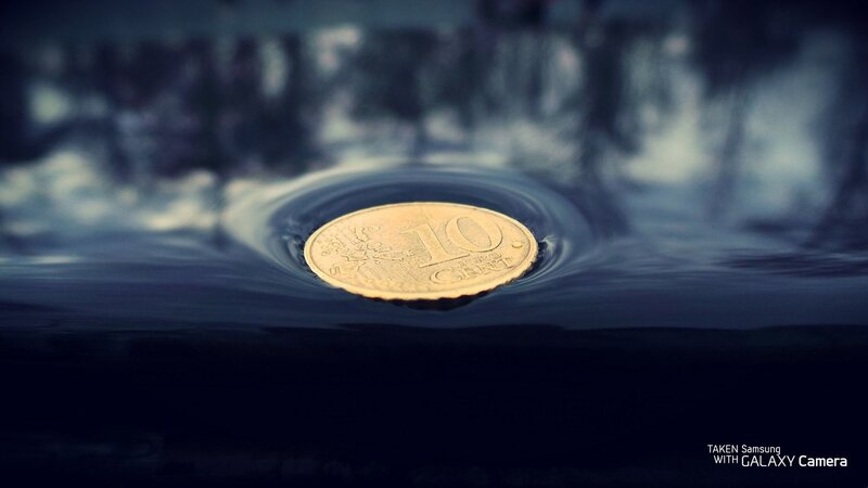 coin dropped in water