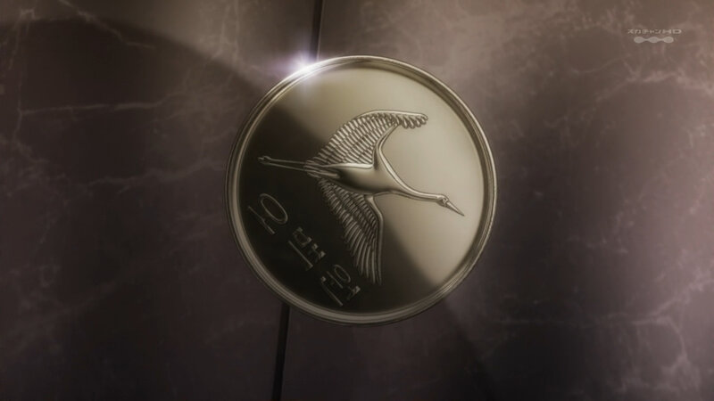 coin with crane design