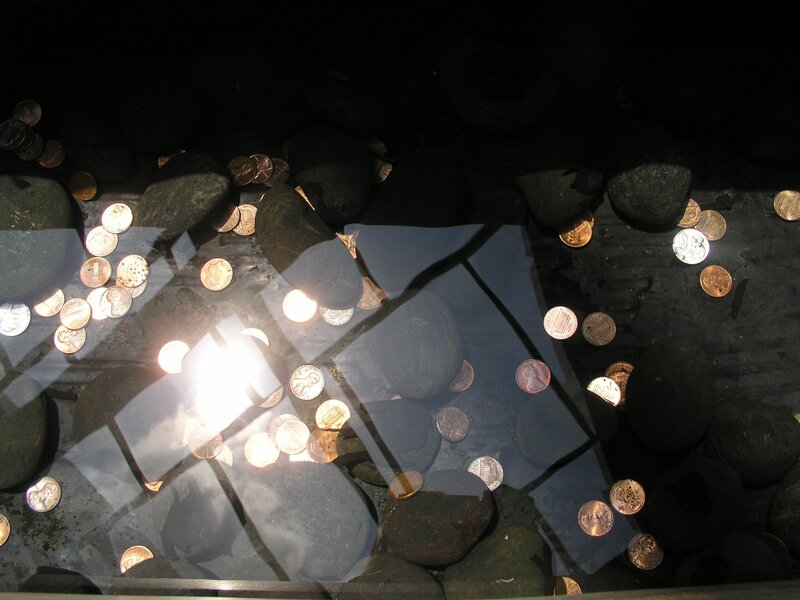 Coins in a reflective display