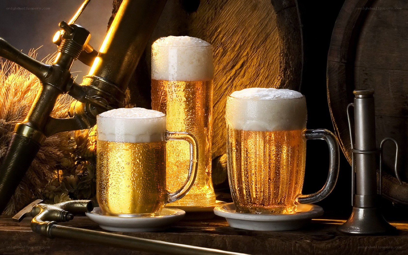 Cold beer glasses on wooden table